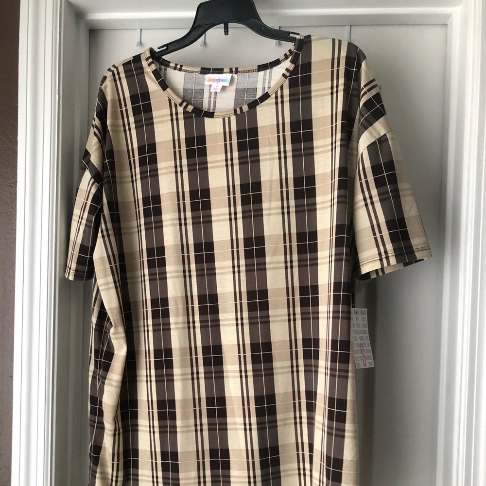 Small brown, cream and tan  Irma